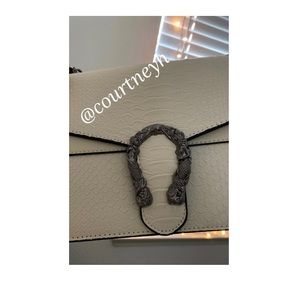 White chained purse